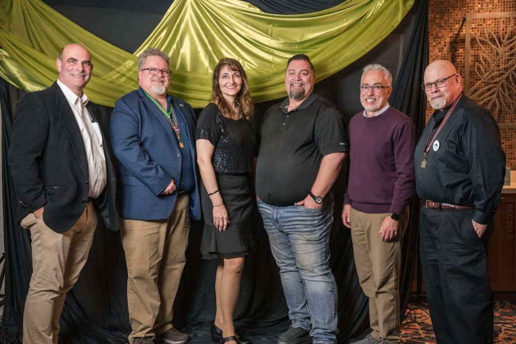 Photo of Kevin Hellriegel, Aaron Hockley, Faye Johnson, Chris Wood, John Crowley, and Andrew Crain